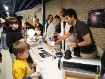 UM Astronomy Graduate Students at Outreach Event 